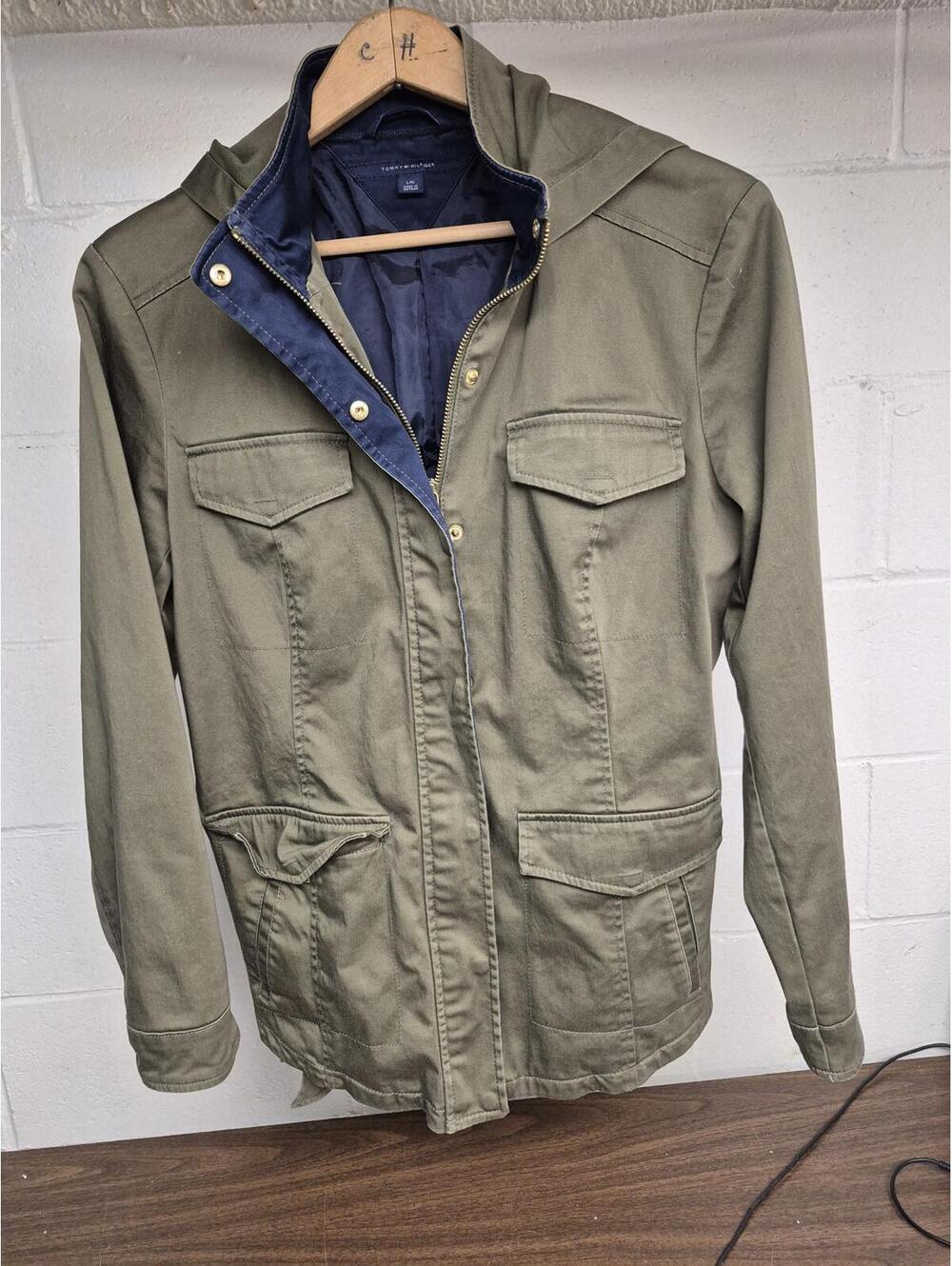 Stylish Tommy Hilfiger Hooded Jacket with large pockets and waist band
